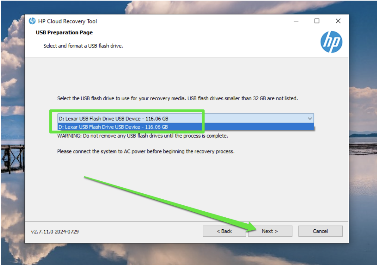 Choose your USB drive on the next page’s drop-down menu and select Next